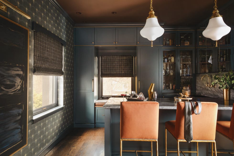 dark bluish green kitchen with island