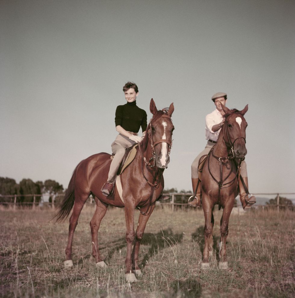 Hepburn And Ferrer On Horseback
