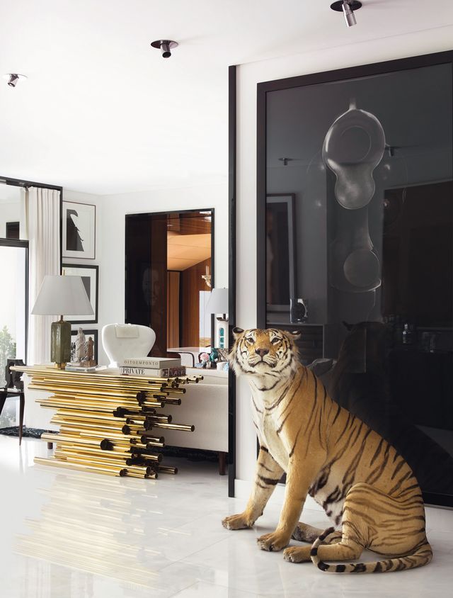 Bengal tiger, Felidae, Tiger, Room, Interior design, Big cats, Carnivore, Siberian tiger, Door, Furniture, 