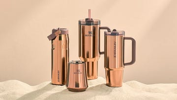 various stainless steel drinkware pieces in a copper finish