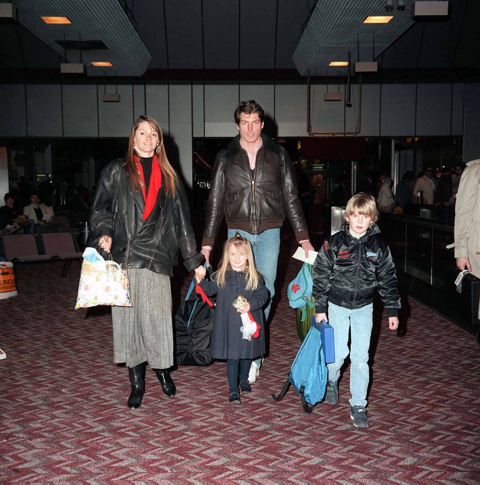 christopher reeve superman actor december 1986, arriving at london airport with his family