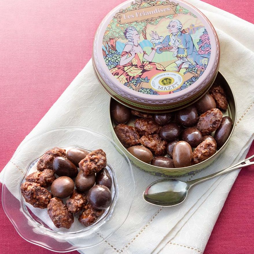 a bowl of chocolate and nuts
