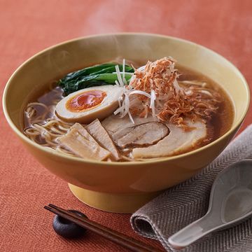 a bowl of soup with noodles and meat