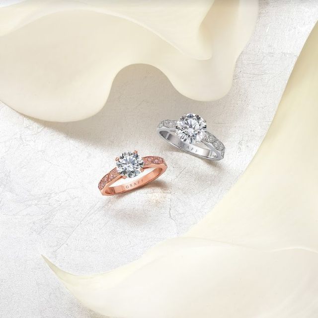 Engagement ring, Ring, Wedding ring, Body jewelry, Wedding ceremony supply, Diamond, Jewellery, Fashion accessory, Platinum, Ear, 
