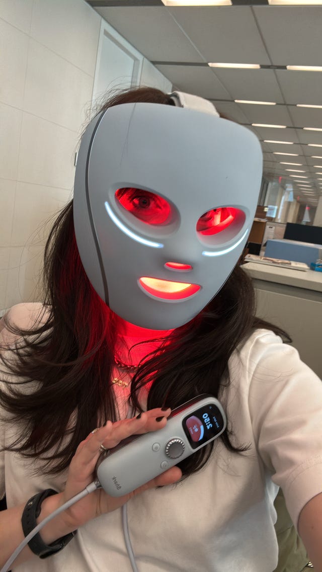 user using a skincare device for treatment