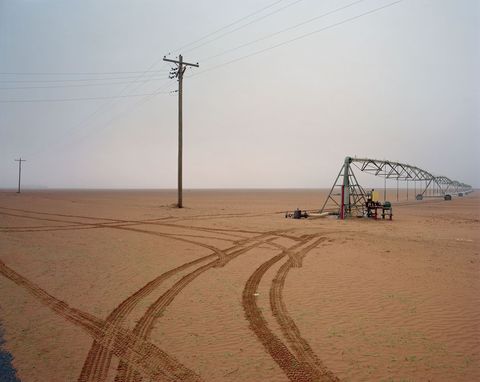 Met behulp van cirkelirrigatie worden akkers met katoen ten zuiden van Brownfield in Texas bewaterd