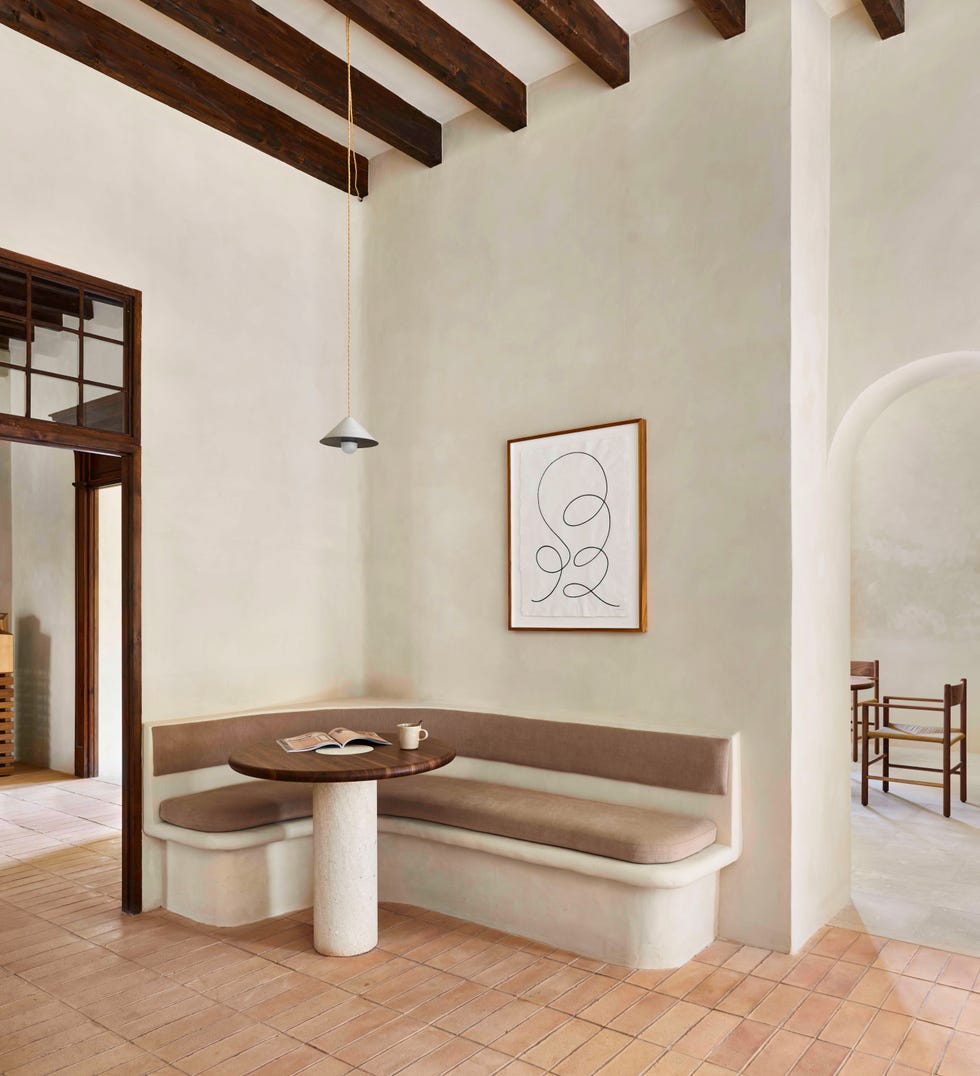 minimalist mallorcan villa dining nook terracotta tiles