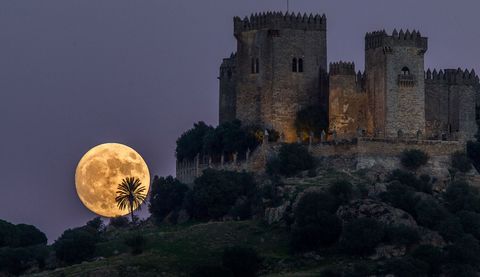The November 2016 supermoon rises near the castle of Almodovar in Cordoba Spain