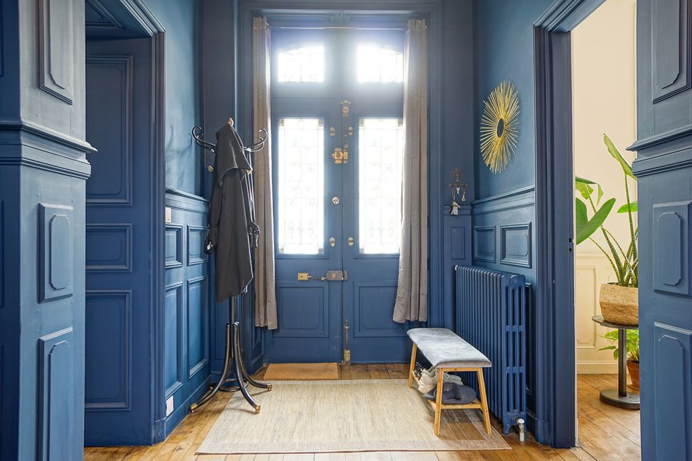 a room with blue doors