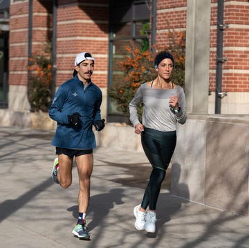 two individuals running outdoors on a sunny day two individuals running outdoors on a sunny day