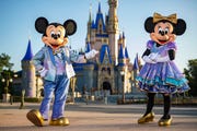 beginning oct 1, 2021, mickey mouse and minnie mouse will host “the world’s most magical celebration” honoring walt disney world resort’s 50th anniversary in lake buena vista, fla they will dress in sparkling new looks custom made for the 18 month event, highlighted by embroidered impressions of cinderella castle on multi toned, earidescent fabric punctuated with pops of gold matt stroshane, photographer