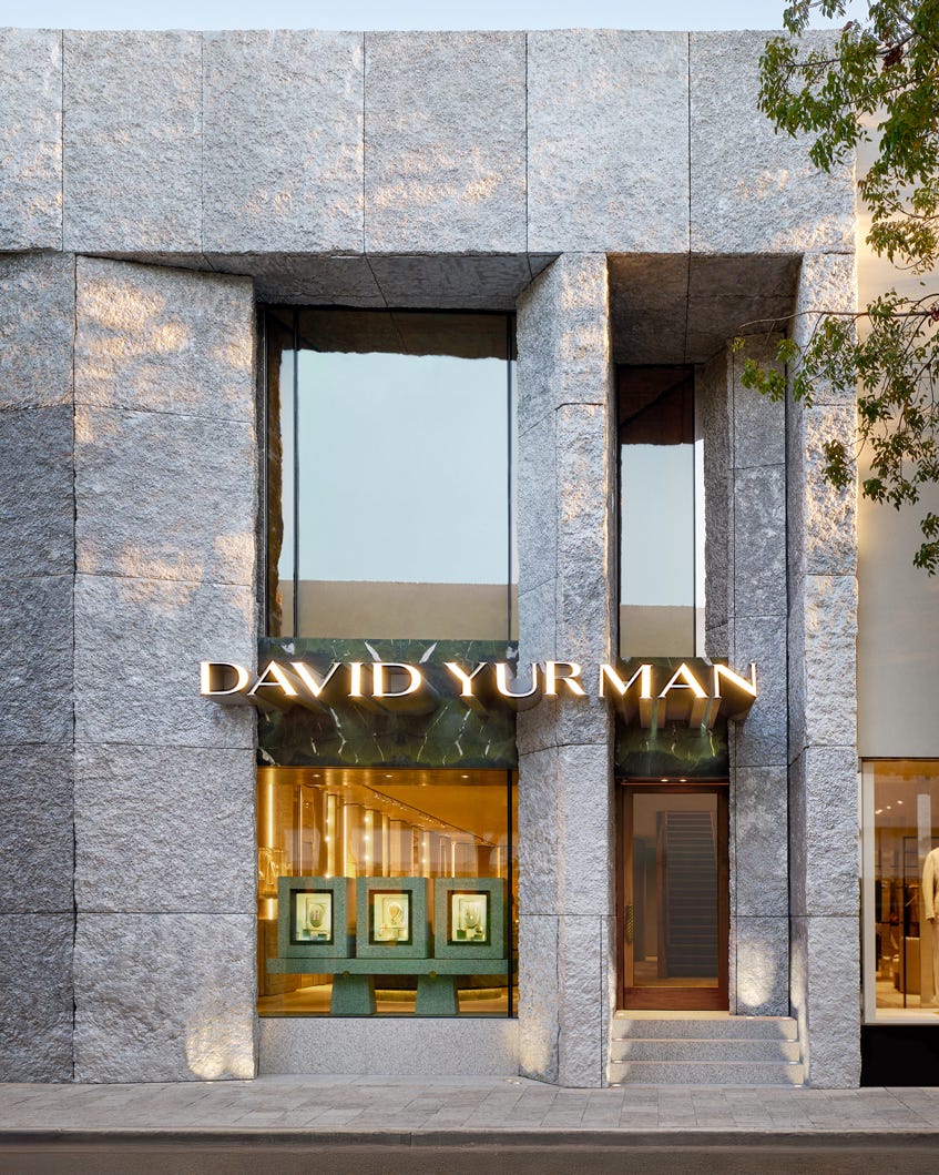 Luxury jewelry store entrance featuring a modern architectural design.