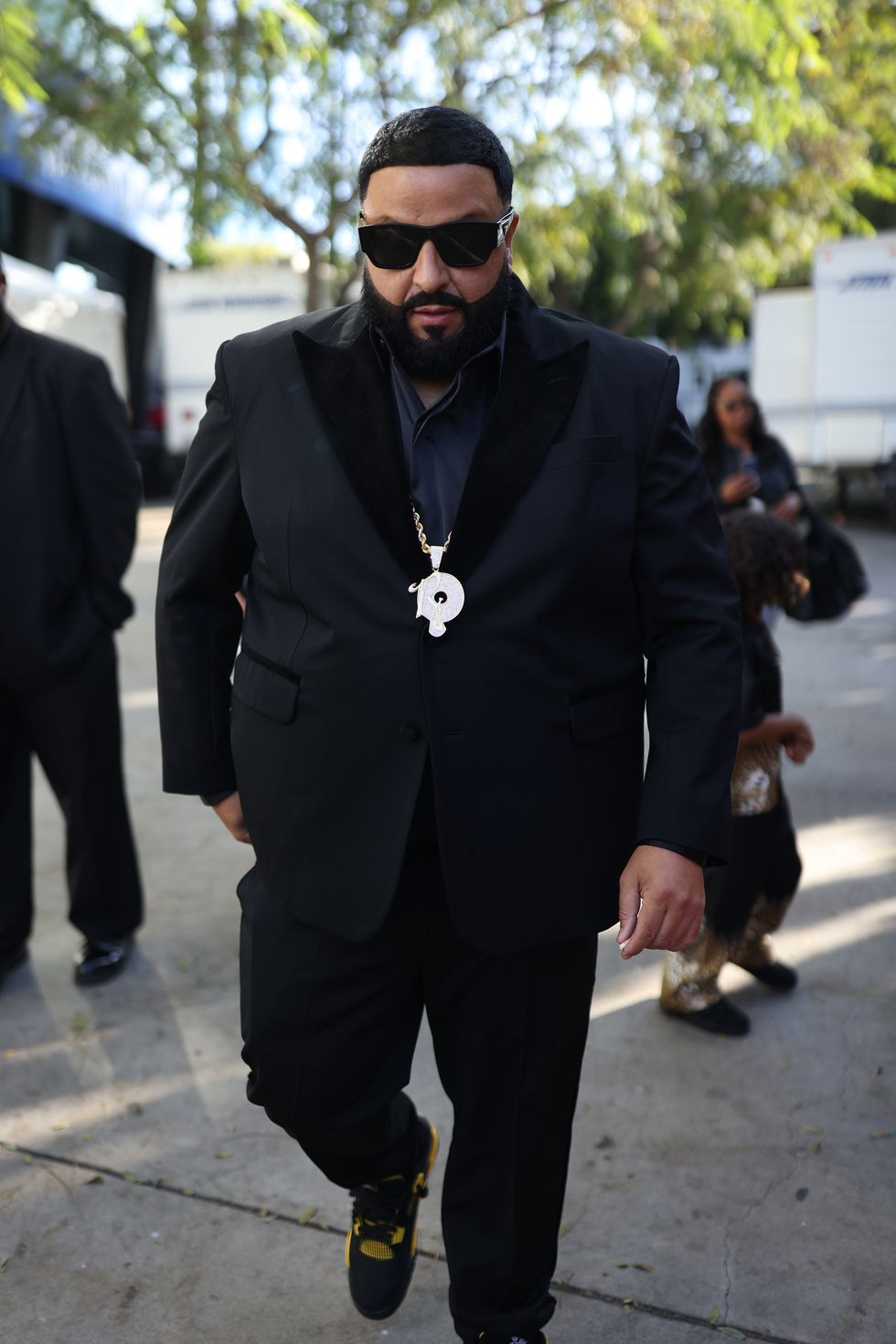 dj khaled, fully suited and ready to go