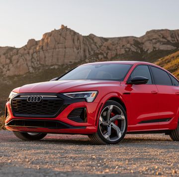 2024 audi sq8 etron sportback red car parked on a road