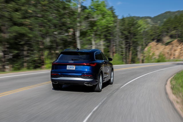 2025 Audi Q5 driving on a mountain pass
