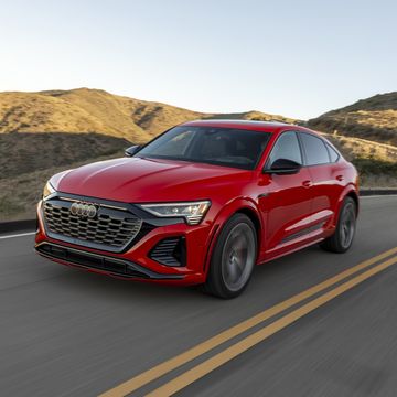 2024 audi sq8 etron sportback red car on winding road