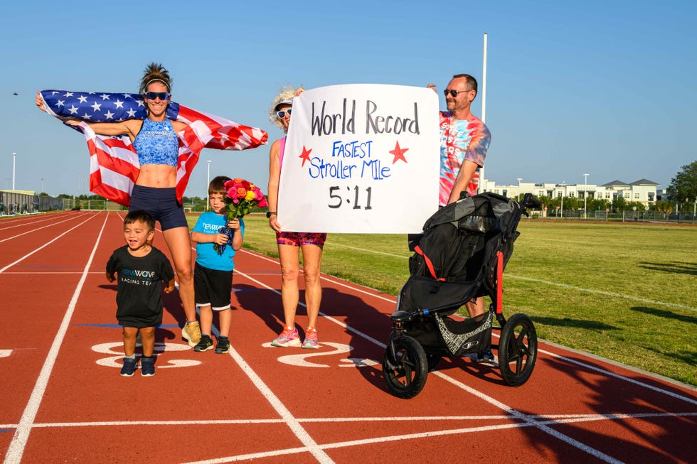 a group of people holding a sign