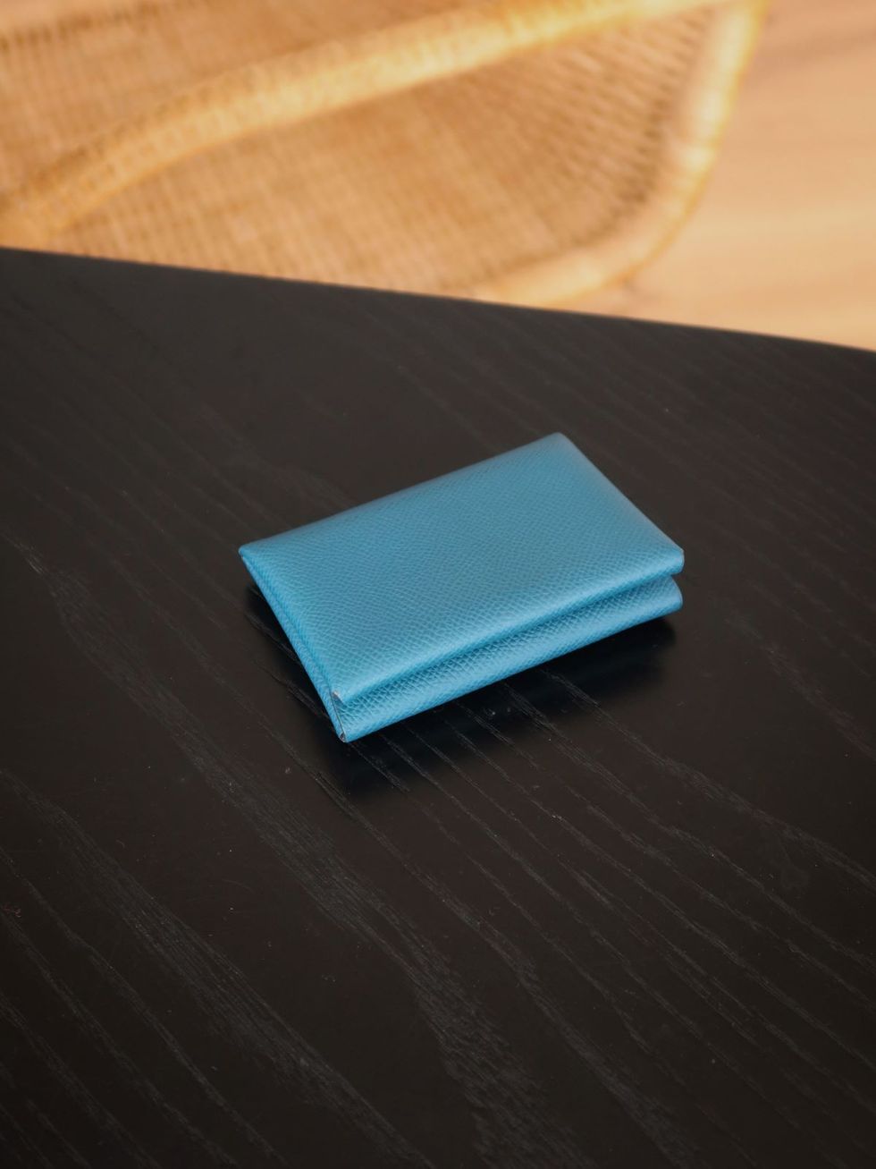 a blue square on a black surface