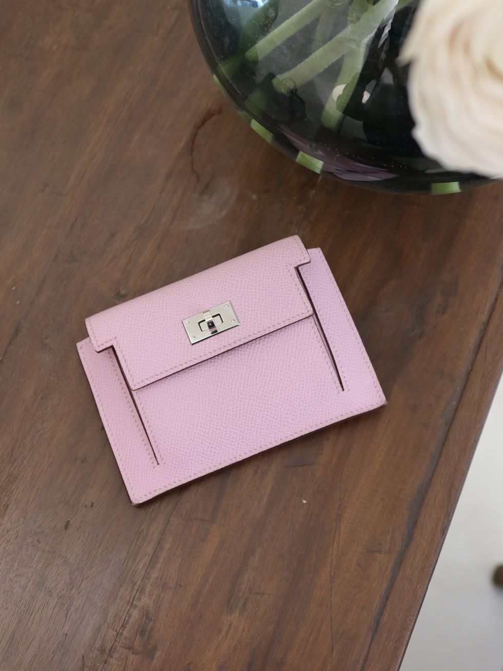 a pink bag on a table