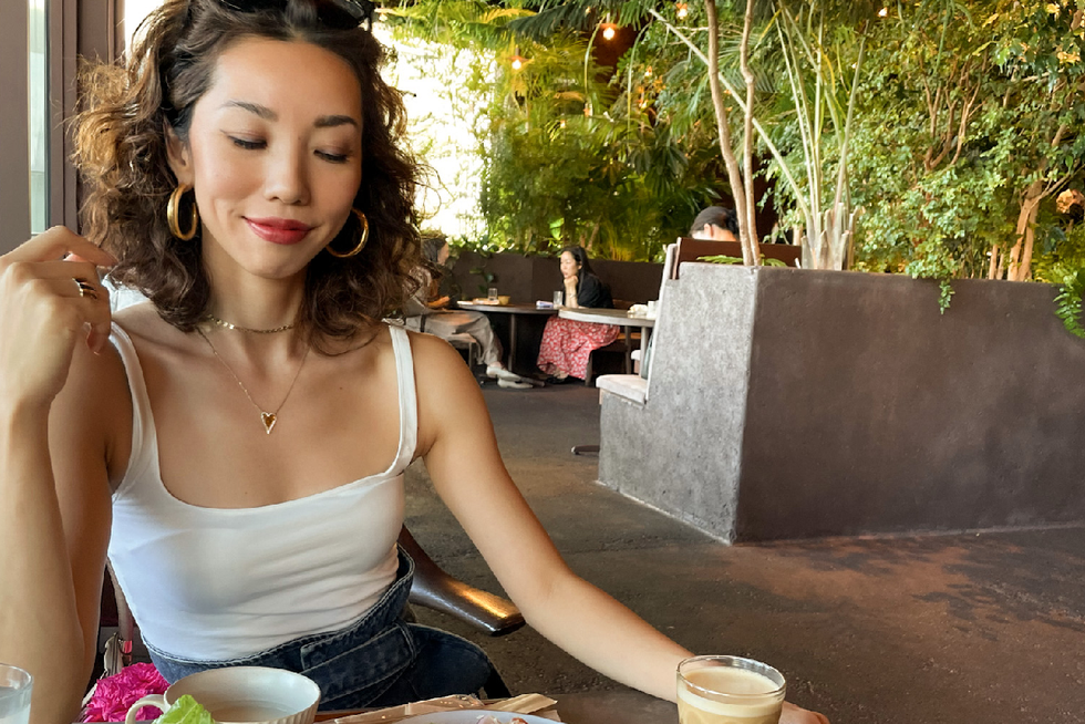 a woman sitting at a table