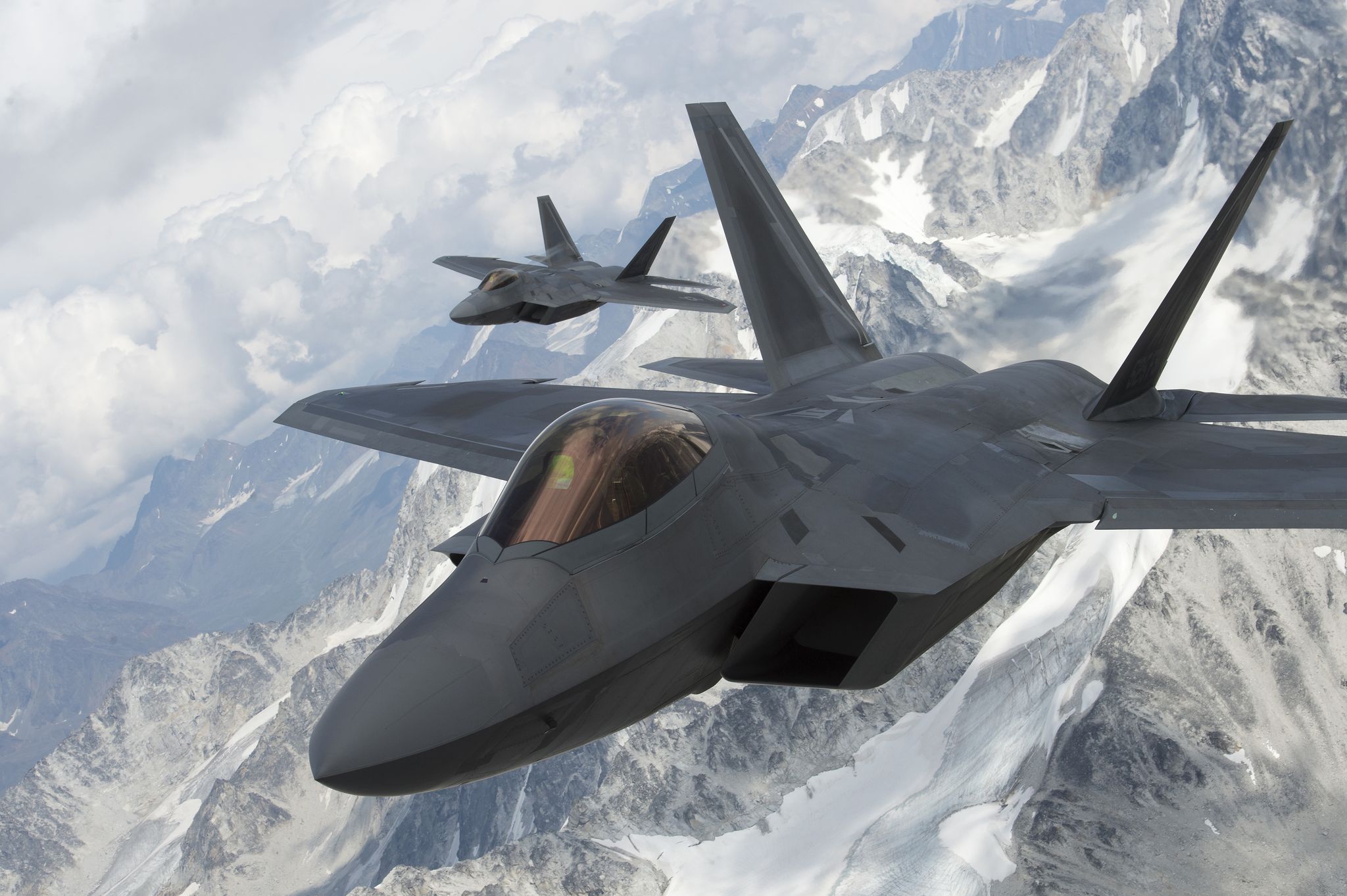 us air force f 22 raptors from joint base elmendorf richardson, fly in formation over the joint pacific alaska range complex, july 18, 2019 the jparc is a 67,000 plus square mile area, providing a realistic training environment commanders leverage for full spectrum engagements, ranging from individual skills to complex, large scale joint engagements  us air force photo by staff sgt james richardson