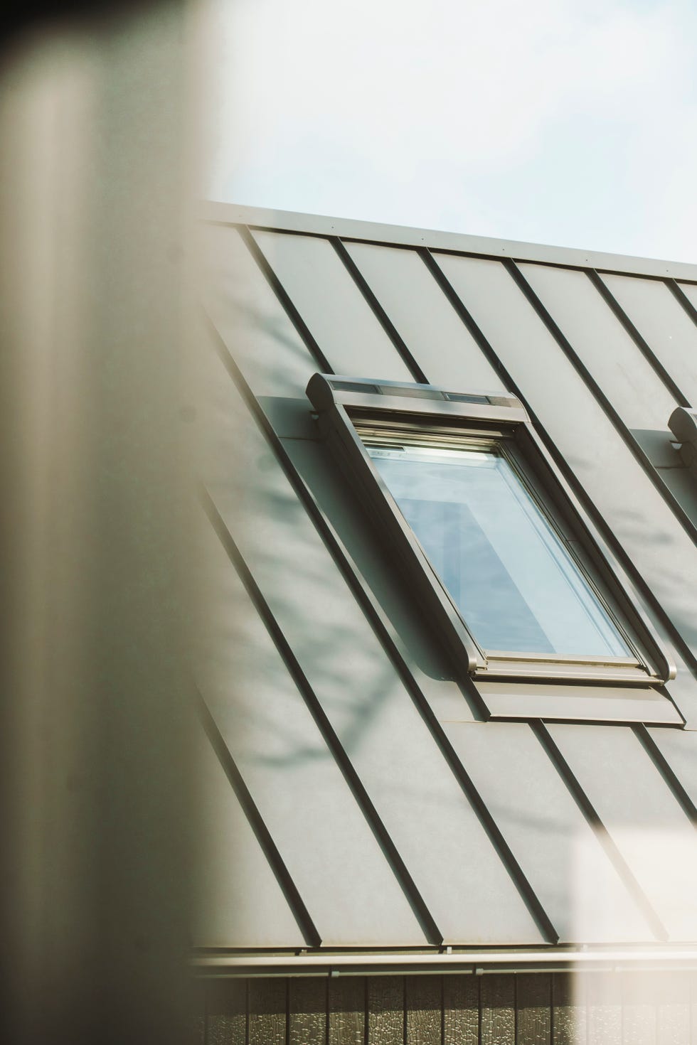 a velux roof window from the exterior of the factory house in muiden, the netherlands