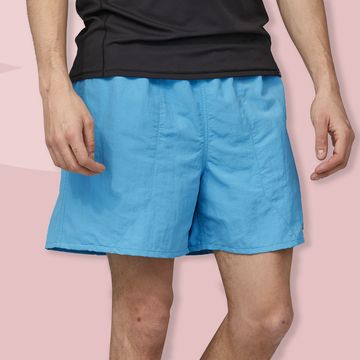 a person wearing blue shorts