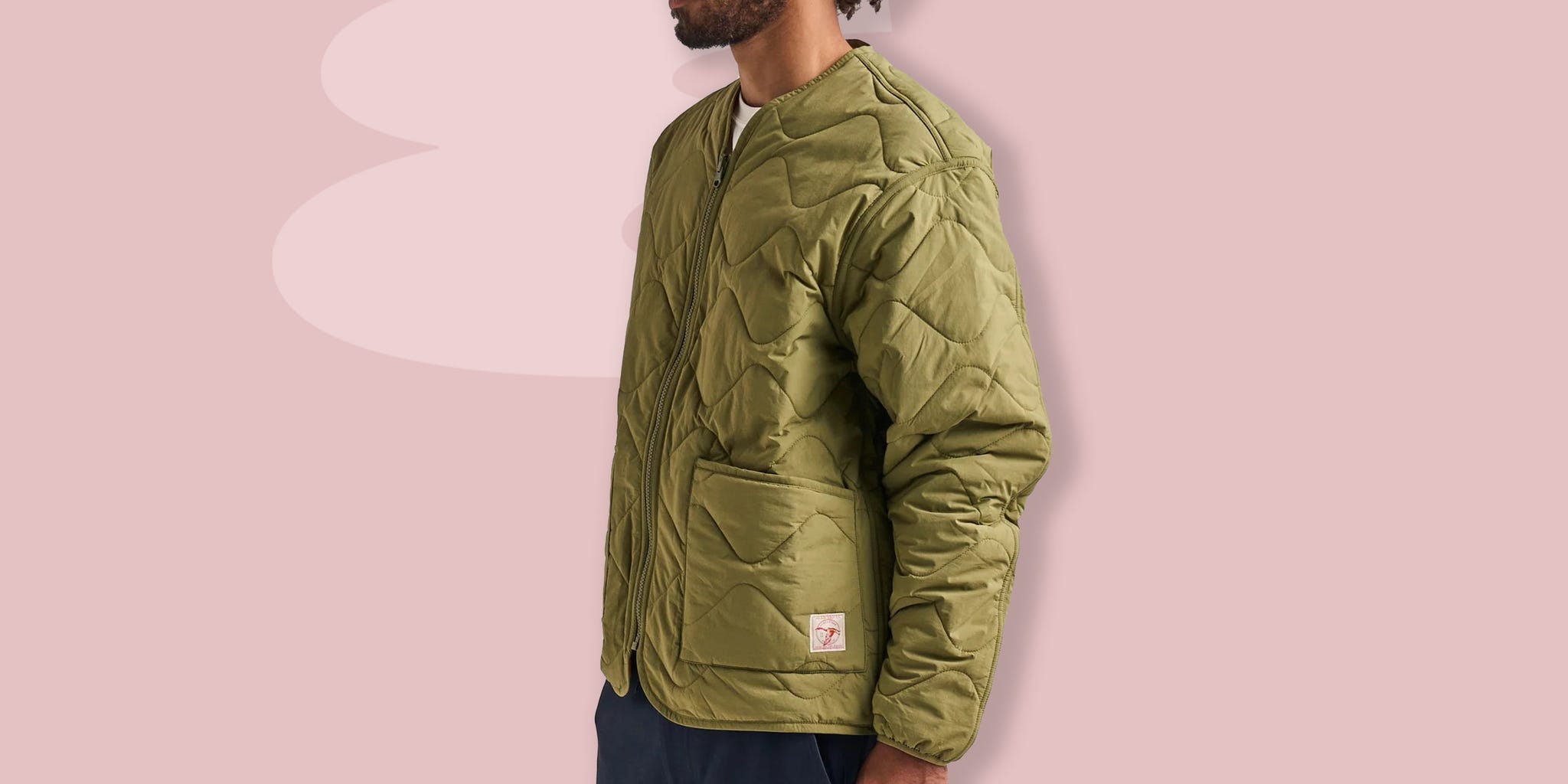 a person wearing a green jacket
