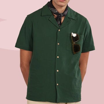 a man wearing a green shirt