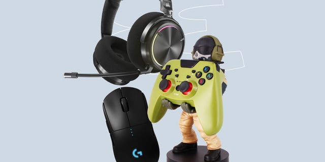 gaming peripherals and a figurine on a light background