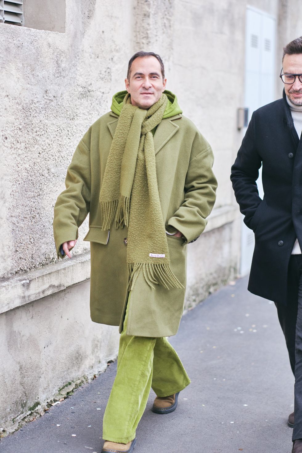 milan, italy january 14 a guest wears full green akne studio look outside prada show during the milan fashion week menswear fallwinter 2024 2025 on january 14, 2024 in milan, italy photo by ferda demirgetty images