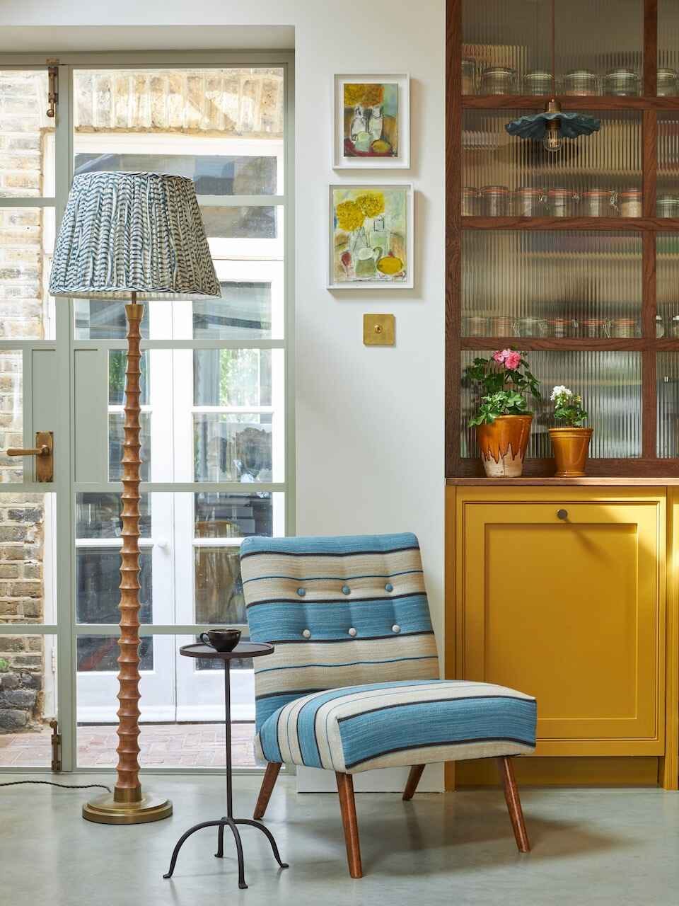 cosy living space featuring a comfortable chair and decorative elements