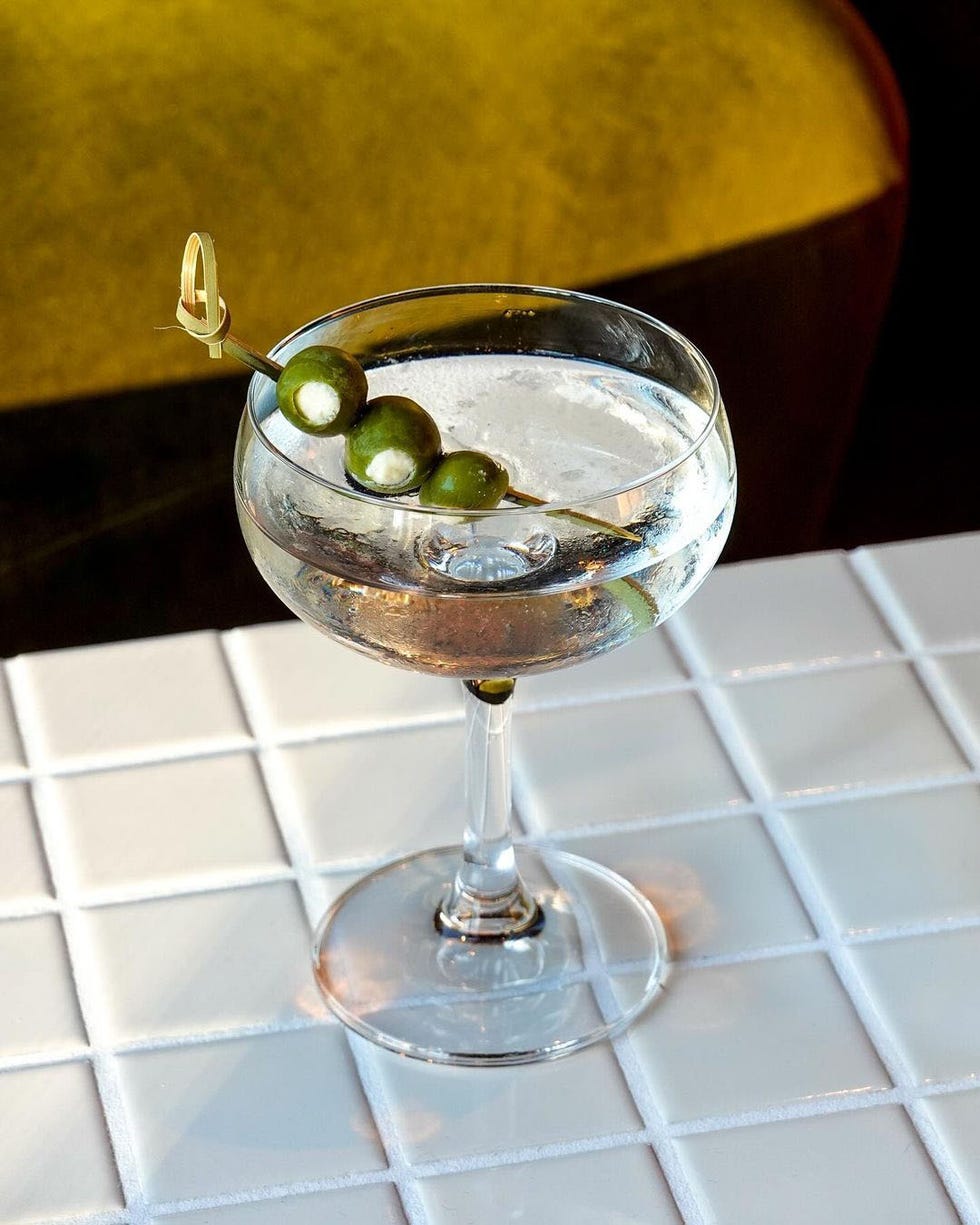 a glass with a drink in it