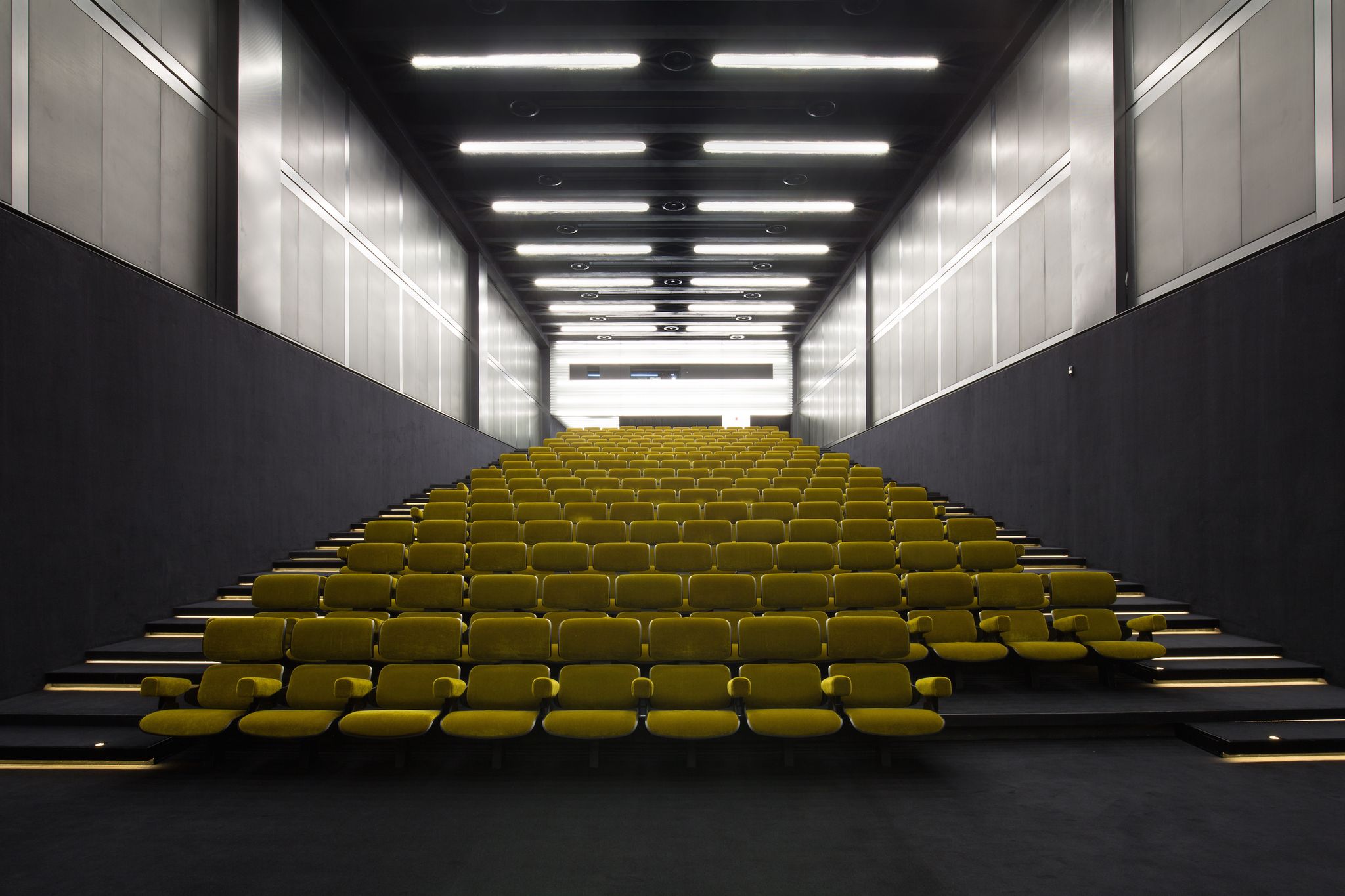 Yellow, Light, Architecture, Stairs, Line, Ceiling, Building, Auditorium, Daylighting, Symmetry, 