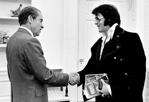 President Richard Nixon shakes hands with Elvis Presley at the White House on December 21, 1970