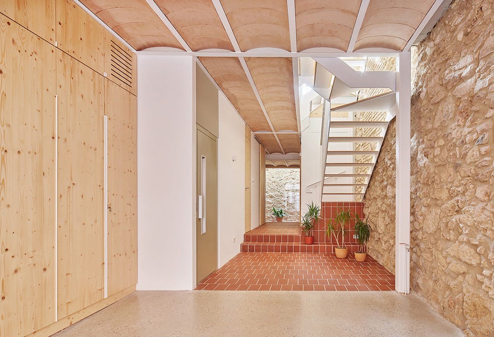 Entrance renovated historic house with mud floor