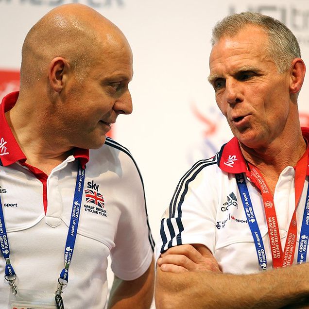 Sir Dave Brailsford, ex-British Cycling Perfromance Director, speaks with ex-Head Coach Shane Sutton on day three of the UCI Track Cycling World Cup at Manchester Velodrome on November 3, 2013.