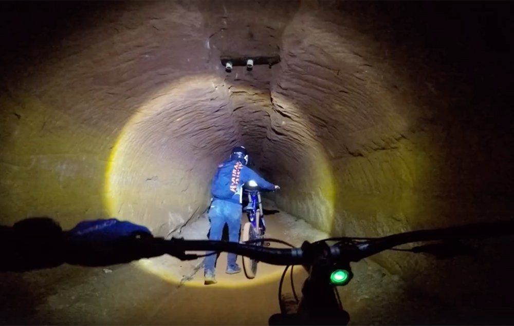 mine shaft cave cyclists mountain bike