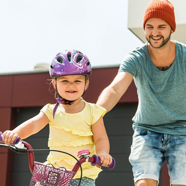 france helmet law young girl dad learning to ride bike