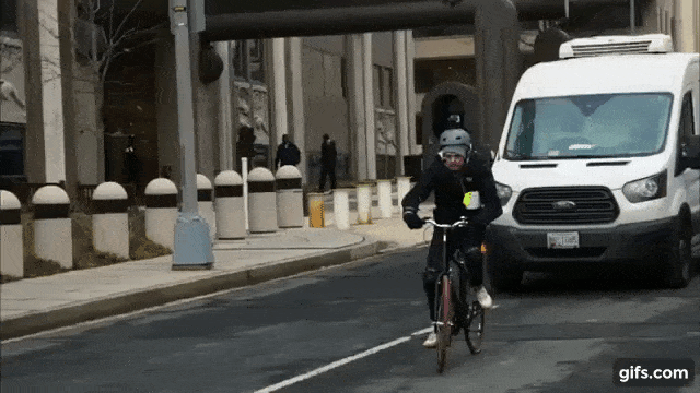 Man on Bike Protests Net Neutrality by Slowing Traffic Outside FCC  Headquarters | Bicycling