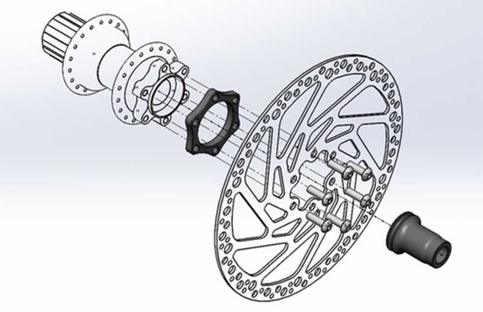 The ingenious Boostinator shifts the entire hub sideways in the frame to line the cassette up with the drivetrain in Boost spacing. The disc adaptor puts the rotor back in line with the caliper.