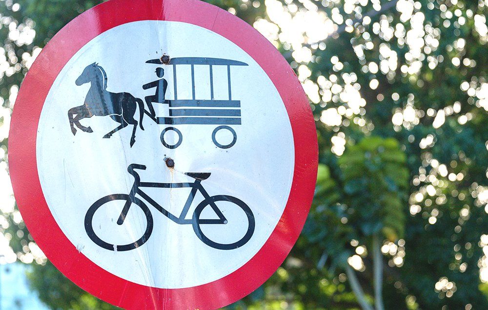 horse-drawn carriage bicycle sign cuba 