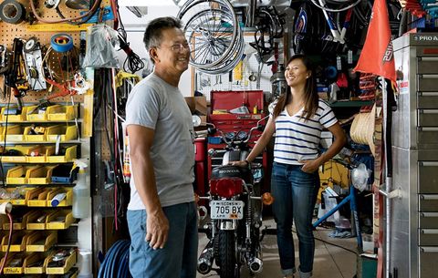 Coryn and her father, Wally, 53, in the garage of her childhood home in Tustin, California