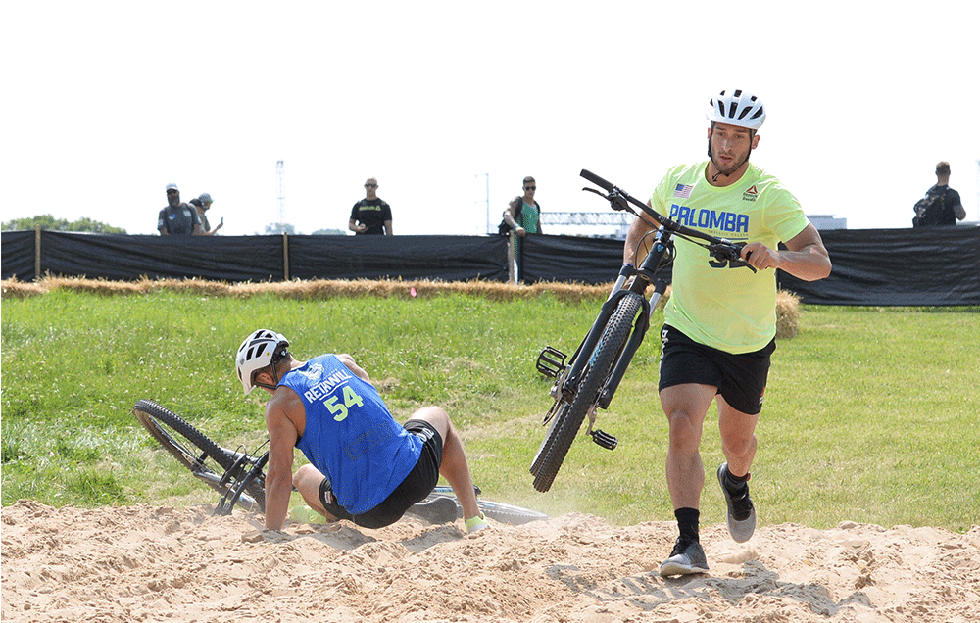 cyclocross competitors crash at the CrossFit Games