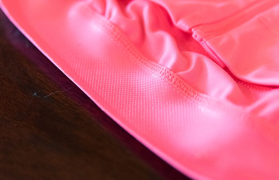 A silicone gripper keeps the jersey in place. The same gripper material is found in the shorts.