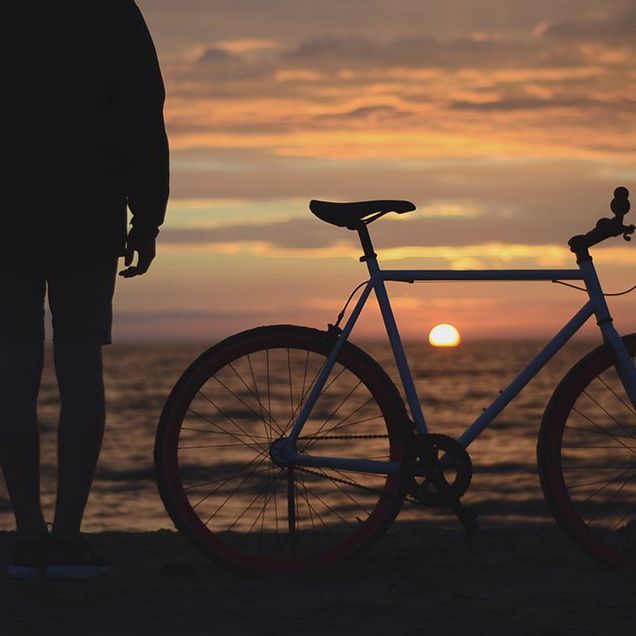 cyclist watching sunset