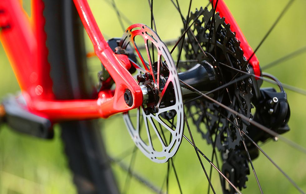 Bicycle wheel, Bicycle part, Bicycle tire, Bicycle, Wheel, Vehicle, Red, Bicycle drivetrain part, Rim, Spoke, 