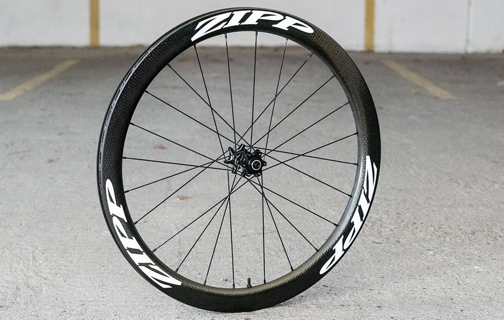 Bicycle tire, Bicycle wheel rim, Bicycle wheel, Rim, Spoke, Synthetic rubber, Bicycle part, Carbon, Automotive tire, Black, 