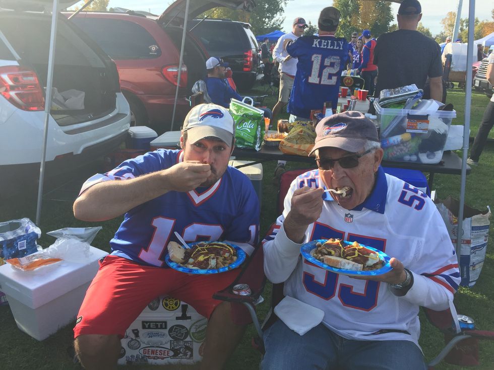 colin dee pictured at bills tailgate with his father