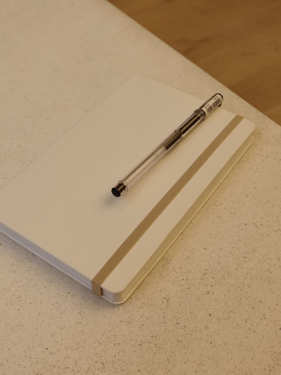 a pen on a notebook